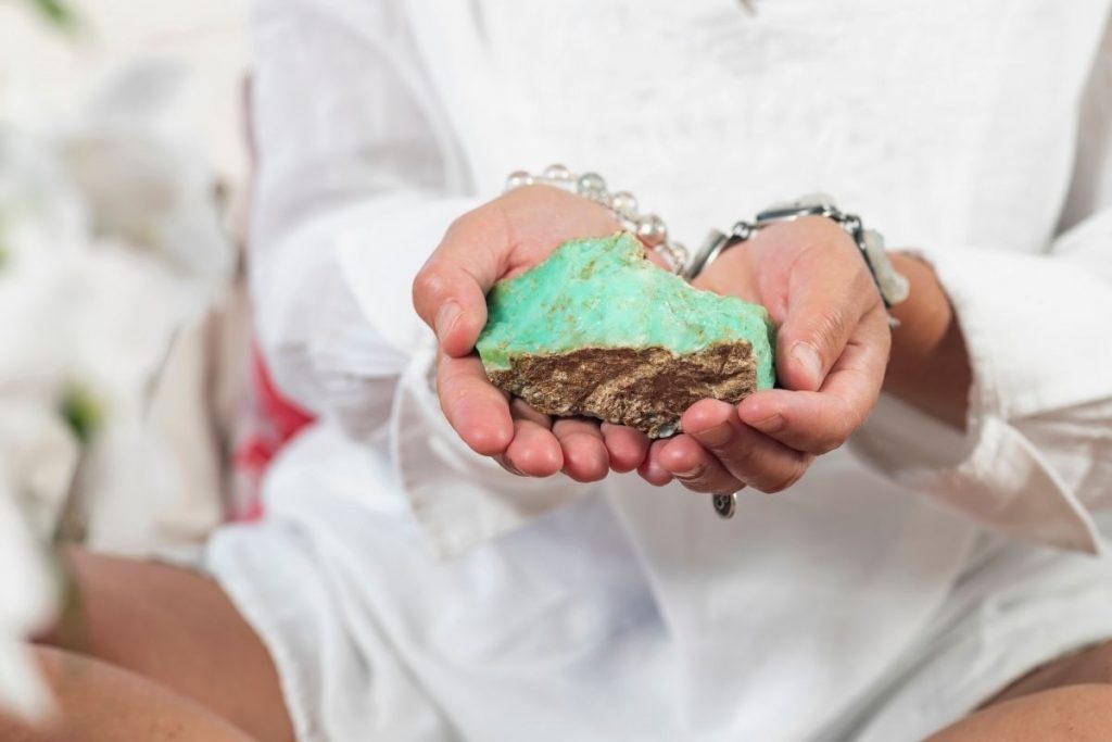 Holding a Large Green Chrysoprase Healing Crystal