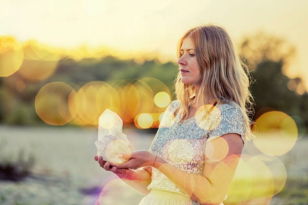 Woman Using Crystals for Healing