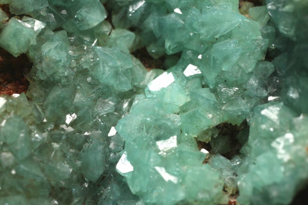 Adamite Crystal Reflecting Light